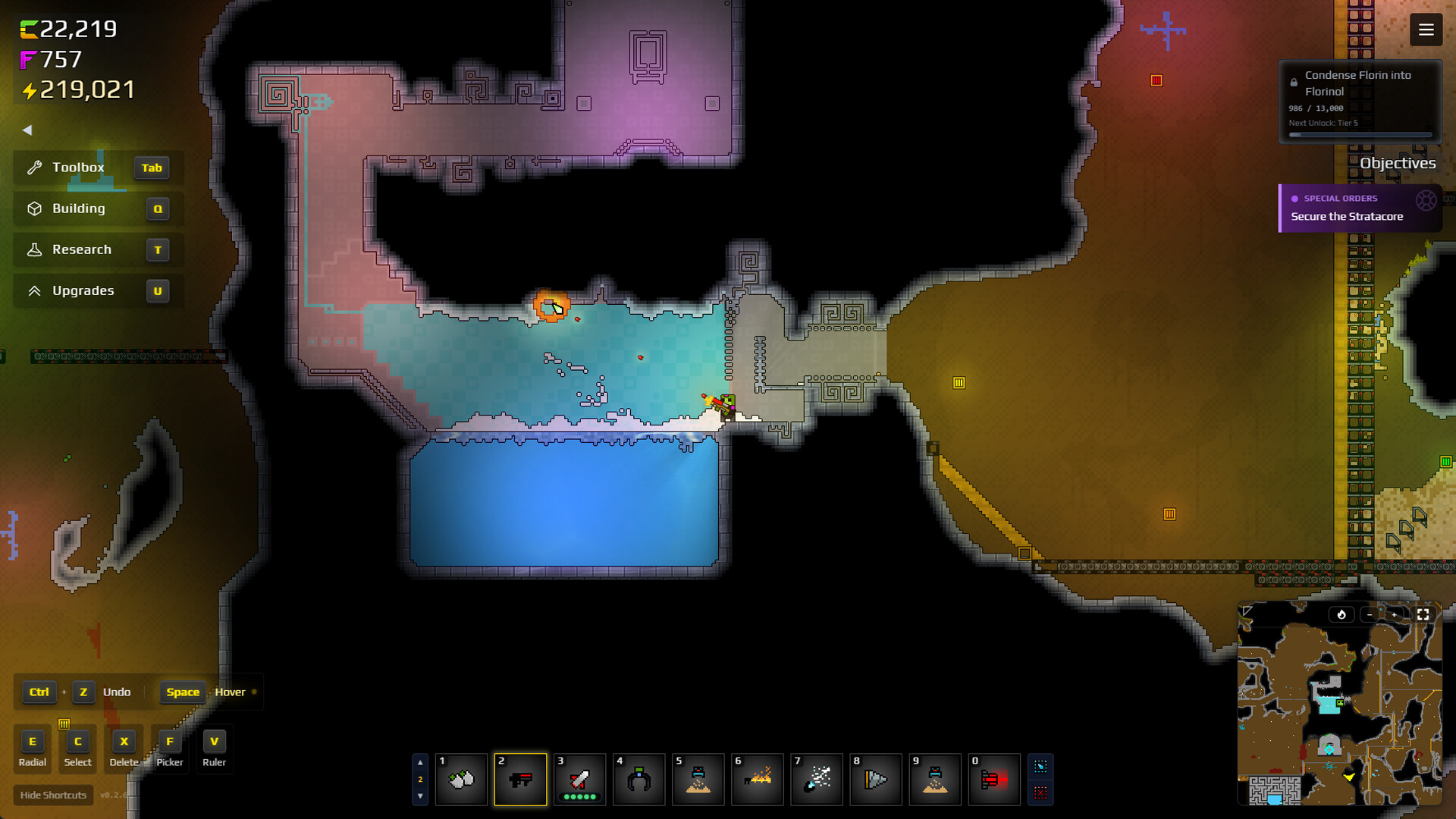 Official Sandustry screenshot showing a cave and blue water chamber beside the player